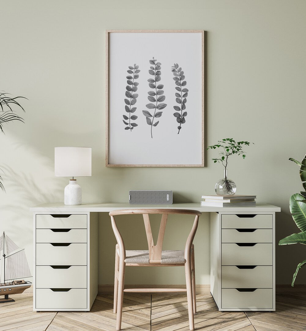 Modern workspace featuring TWIGS, FLORAL FLOWER PAINTINGS, enhancing the serene atmosphere with botanical art.
