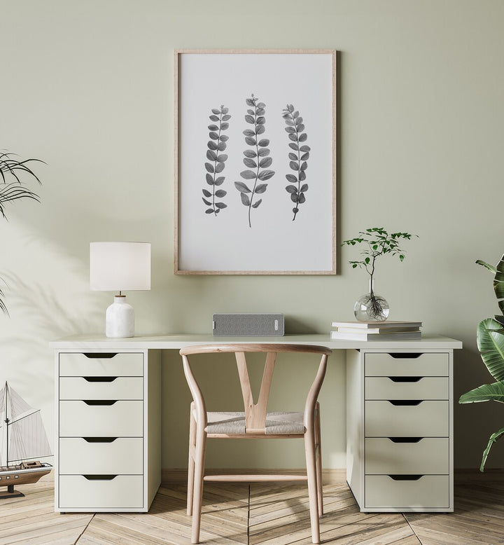 Modern workspace featuring TWIGS, FLORAL FLOWER PAINTINGS, enhancing the serene atmosphere with botanical art.