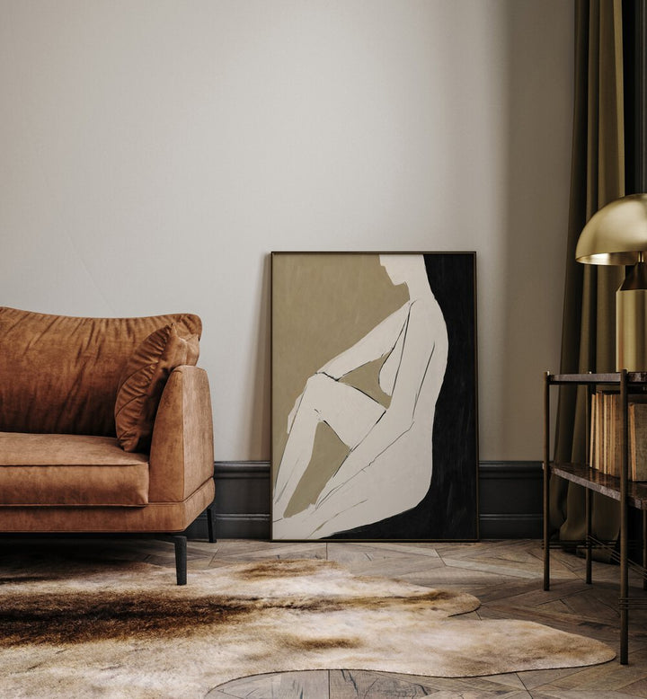 Stylish interior featuring CHILL, PORTRAITS artwork alongside a cozy sofa and elegant decor elements.