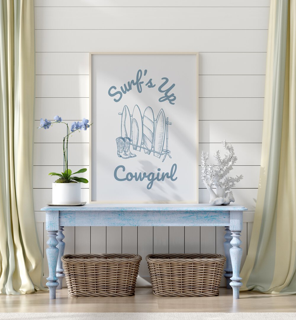 SURFS UP COWGIRL, BEACH PAINTINGS showcase a stylish blend of ocean vibes and western charm in home decor.