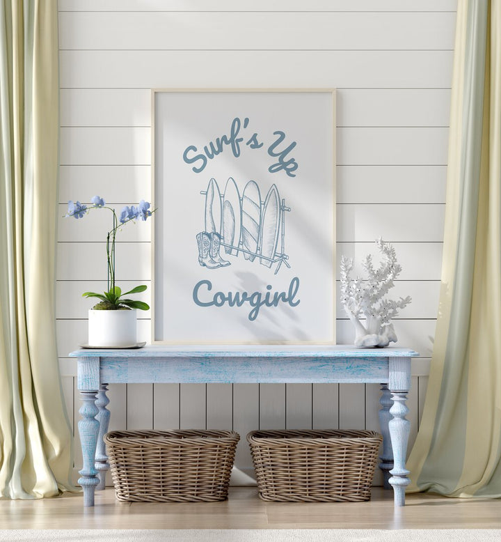 SURFS UP COWGIRL, BEACH PAINTINGS showcase a stylish blend of ocean vibes and western charm in home decor.