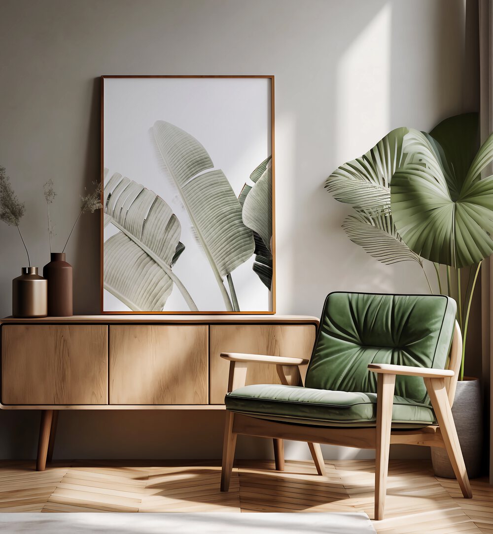 Stylish living room featuring BANANA LEAF I, FLORAL FLOWER PAINTINGS, adding elegance and natural beauty to the decor.