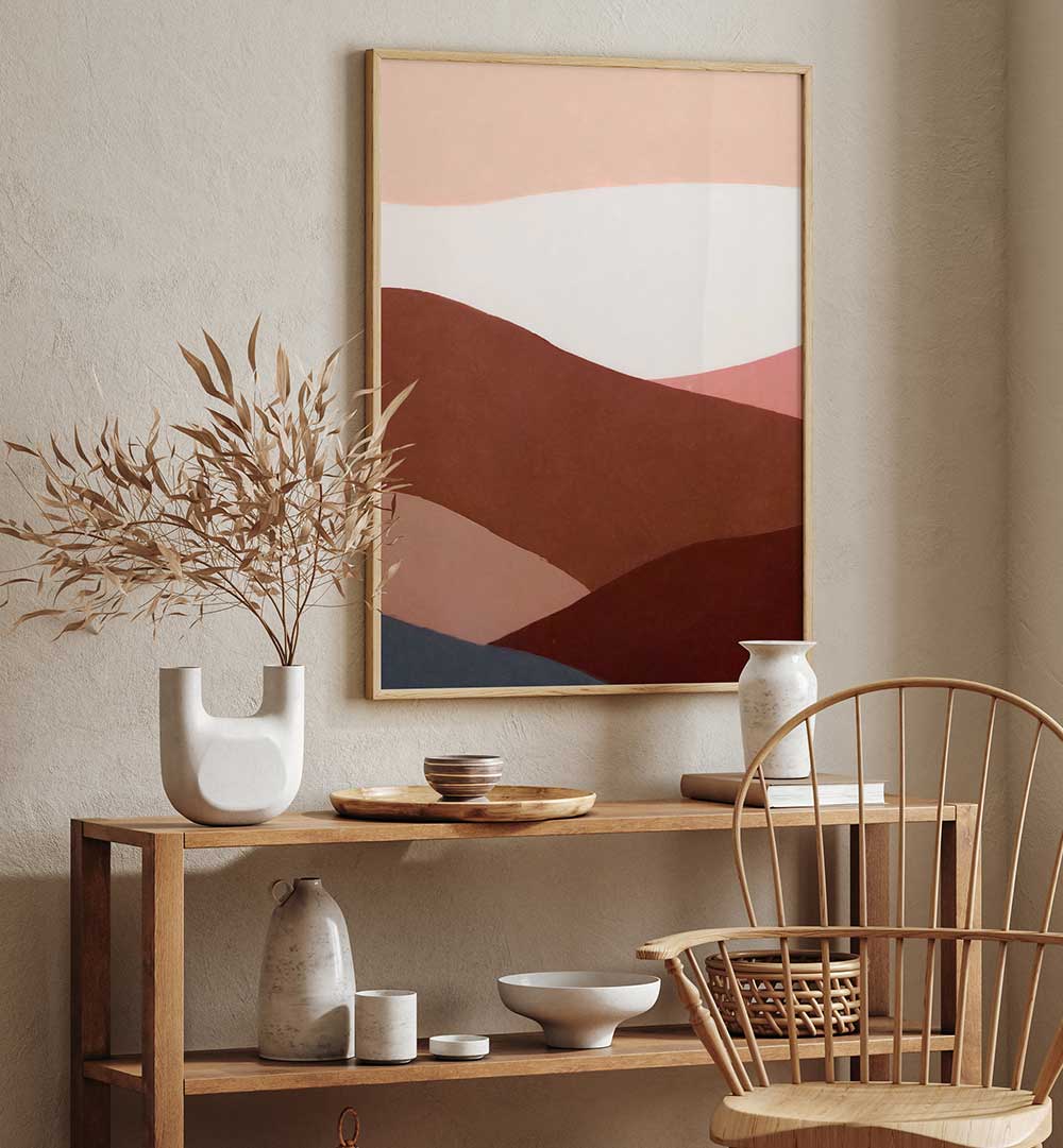 FAR FAR AWAY, ABSTRACT PAINTINGS with warm earth tones displayed above a wooden console in a modern cozy room setting.