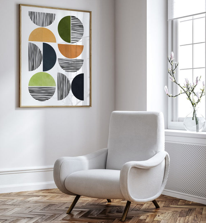 Modern interior featuring LINES AND CIRCLES, GEOMETRIC ART PRINTS, showcasing vibrant shapes and dynamic lines.