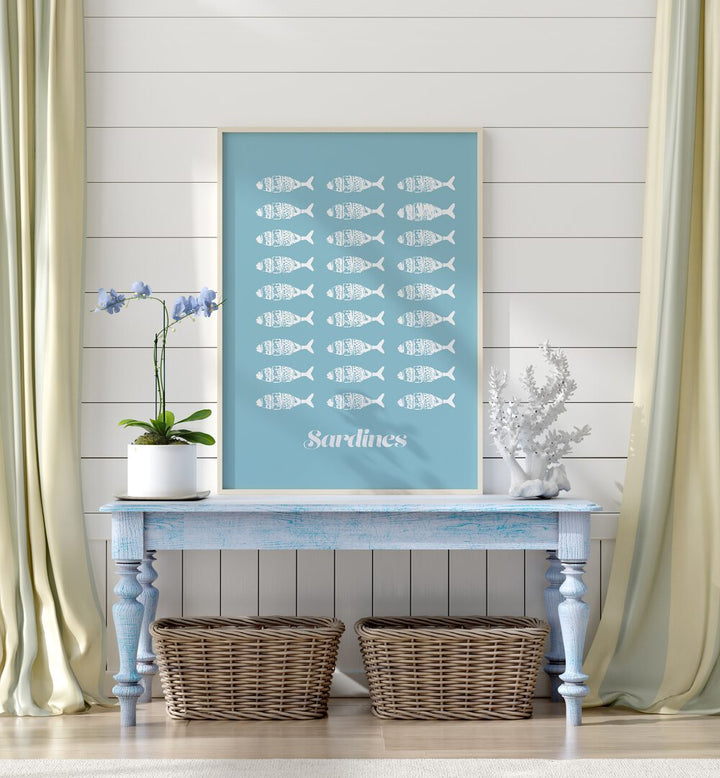 SARDINES WHITE, BEACH PAINTINGS art print adds coastal charm to your space with a serene blue background.