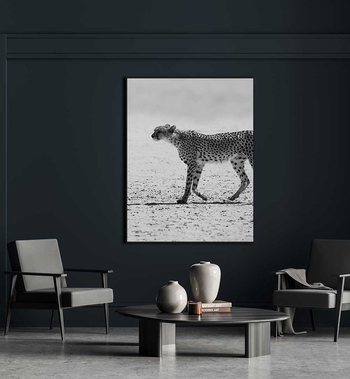 Black-and-white cheetah wall art titled SILENT PURSUIT , ANIMAL PAINTINGS displayed in a modern living room