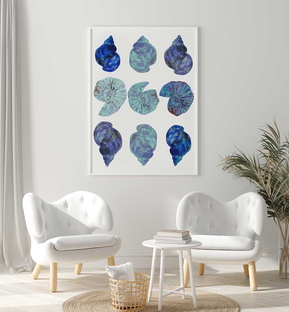 Colorful BLUE SEA SHELLS, BEACH PAINTINGS adorn a stylish living room, evoking coastal serenity and vibrant beach vibes.
