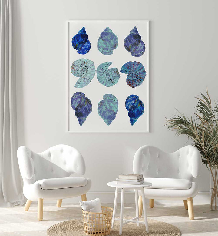 Colorful BLUE SEA SHELLS, BEACH PAINTINGS adorn a stylish living room, evoking coastal serenity and vibrant beach vibes.