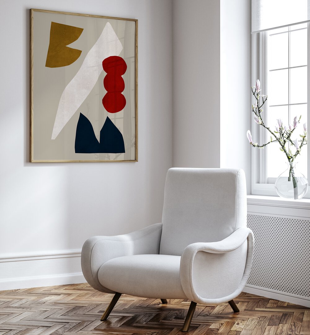 Stylish interior featuring EXPRESSIVE V, GEOMETRIC ART PRINTS above a cozy chair, enhancing creative spaces beautifully.