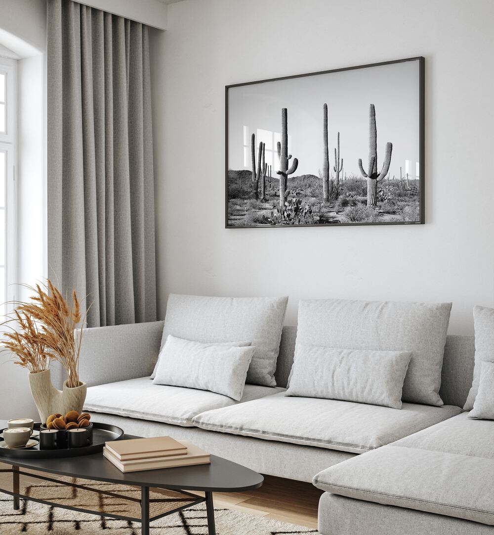Modern living room featuring GREY CACTUS LAND, COWBOY painting, adding desert charm to contemporary decor.