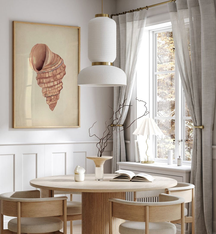 Elegant PINK SEASHELLS , BEACH PAINTINGS adorn a cozy dining space, enhancing coastal charm and tranquility.
