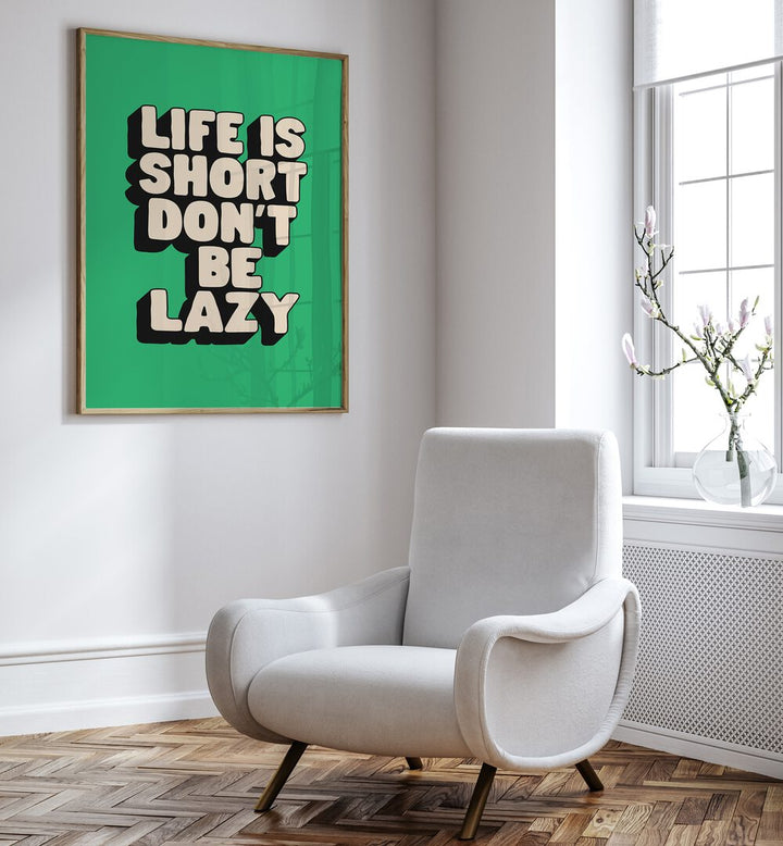 Bright typography poster saying "LIFE IS SHORT DON'T BE LAZY, QUOTES" adds inspiration to any space. Perfect decor!