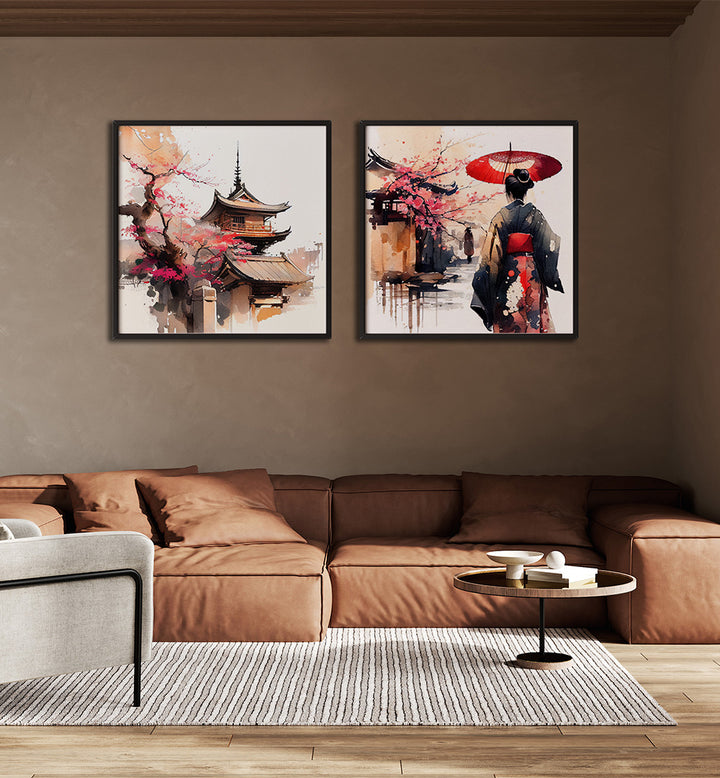Two framed artworks on a wall above a brown sofa in a living room.