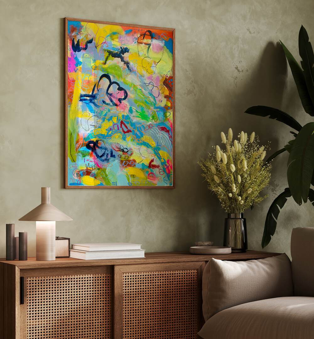 Vibrant FRUITS OF LABOR, ABSTRACT PAINTINGS adorn a stylish living space, celebrating art's emotional resonance.