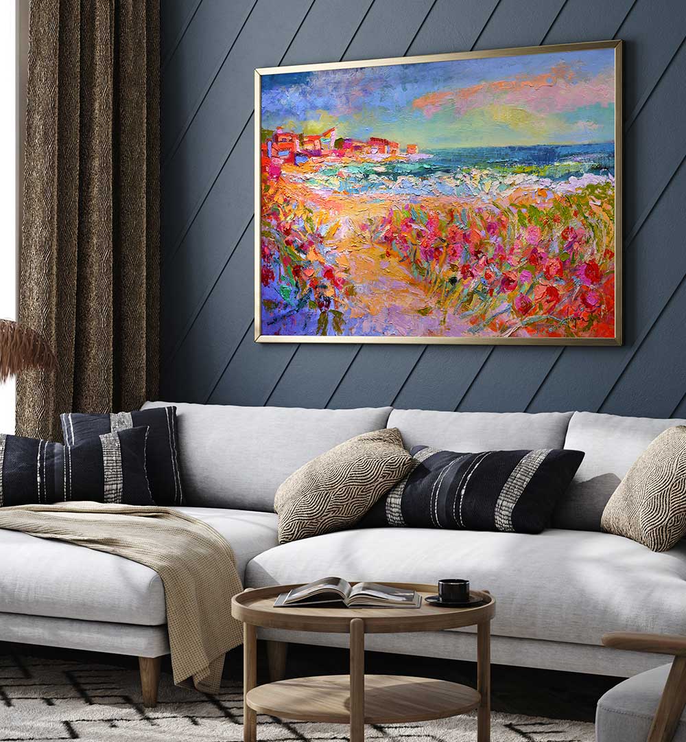 NATURE’S VIVID BEAUTY , LANDSCAPE PAINTINGS vibrant coastal scene with wildflowers framed above modern sofa