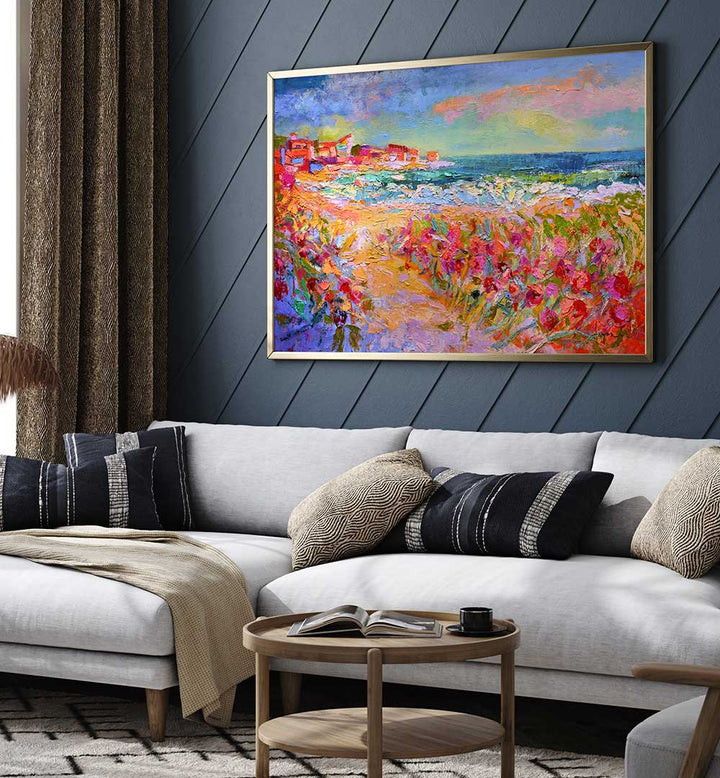 NATURE’S VIVID BEAUTY , LANDSCAPE PAINTINGS vibrant coastal scene with wildflowers framed above modern sofa