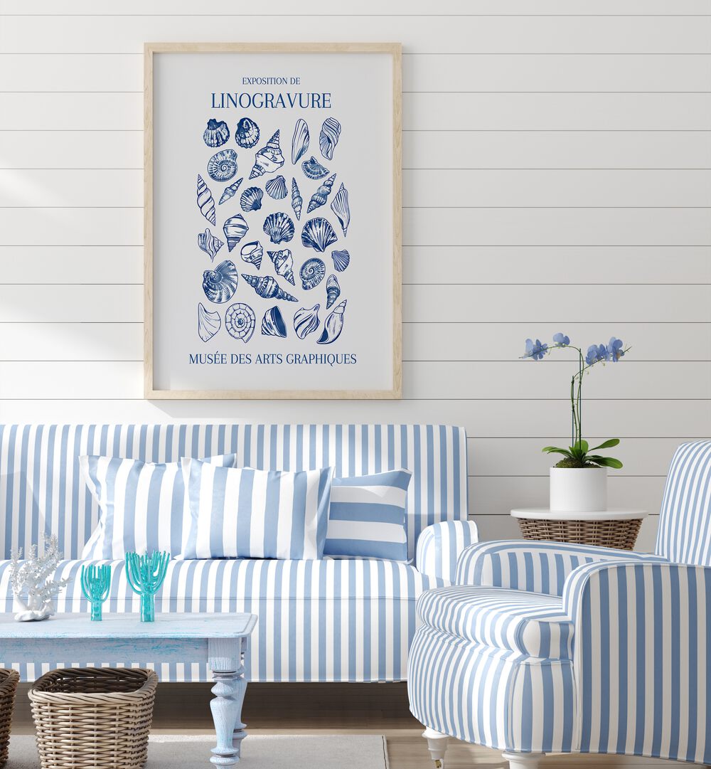 LINO SEASHELL ART MARKET, BEACH PAINTINGS showcased in a stylish living room with coastal decor and blue tones.