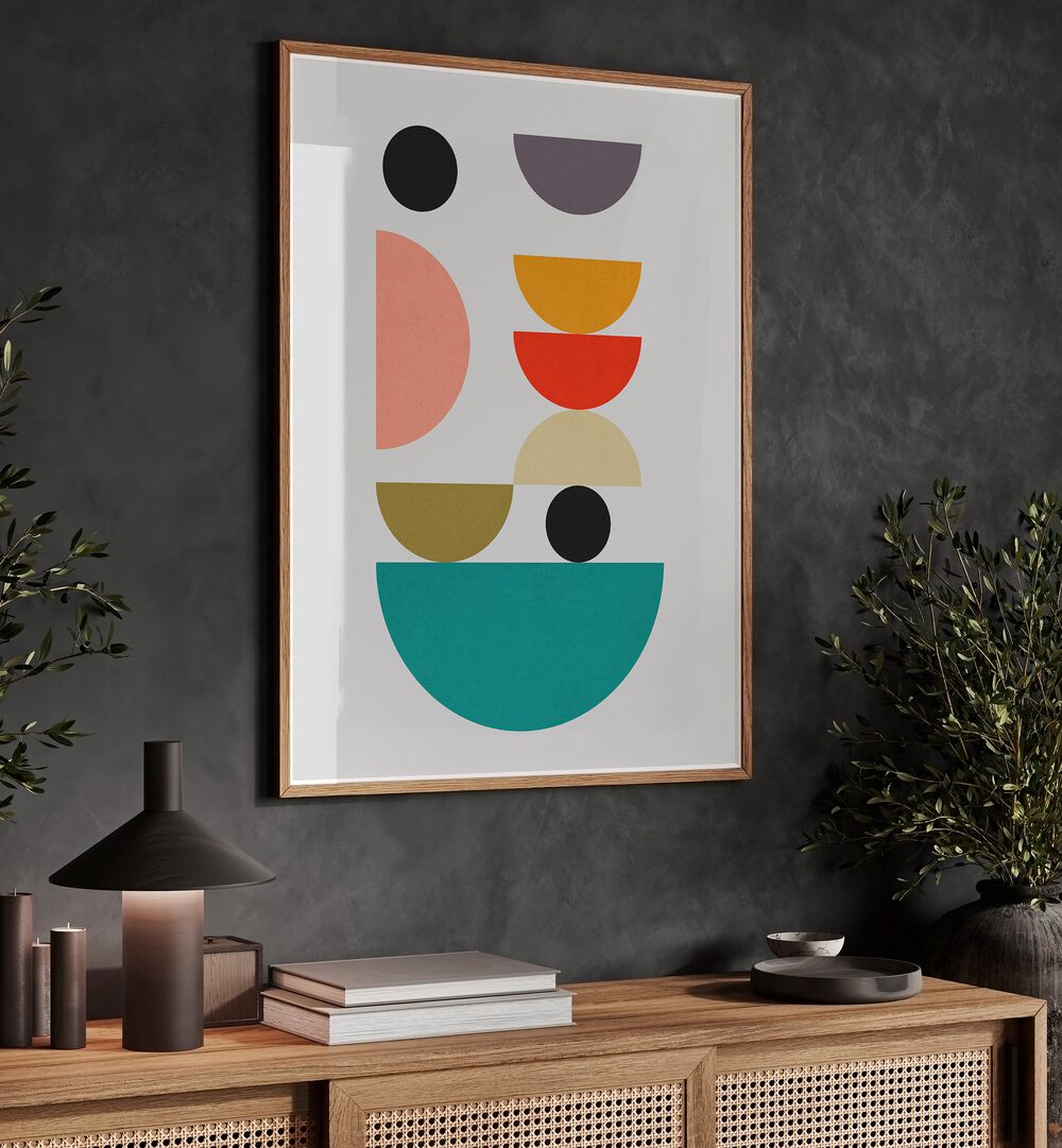 Colorful HARMONY II, GEOMETRIC ART PRINTS displayed in a wooden frame, enhancing modern decor with vibrant shapes.