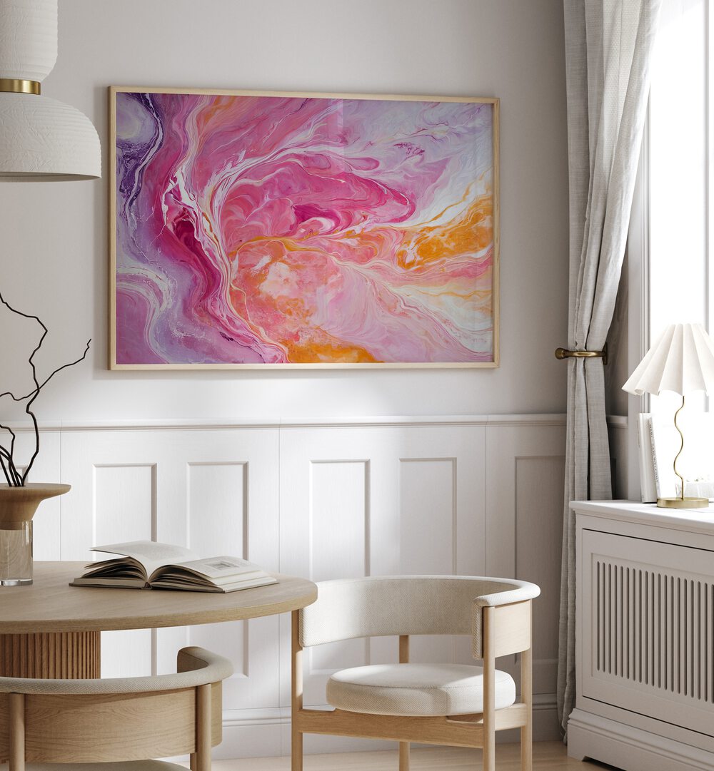 Vibrant SWIRLING PATTERNS, ABSTRACT PAINTINGS in pink and orange enhance modern home decor with bold colors.