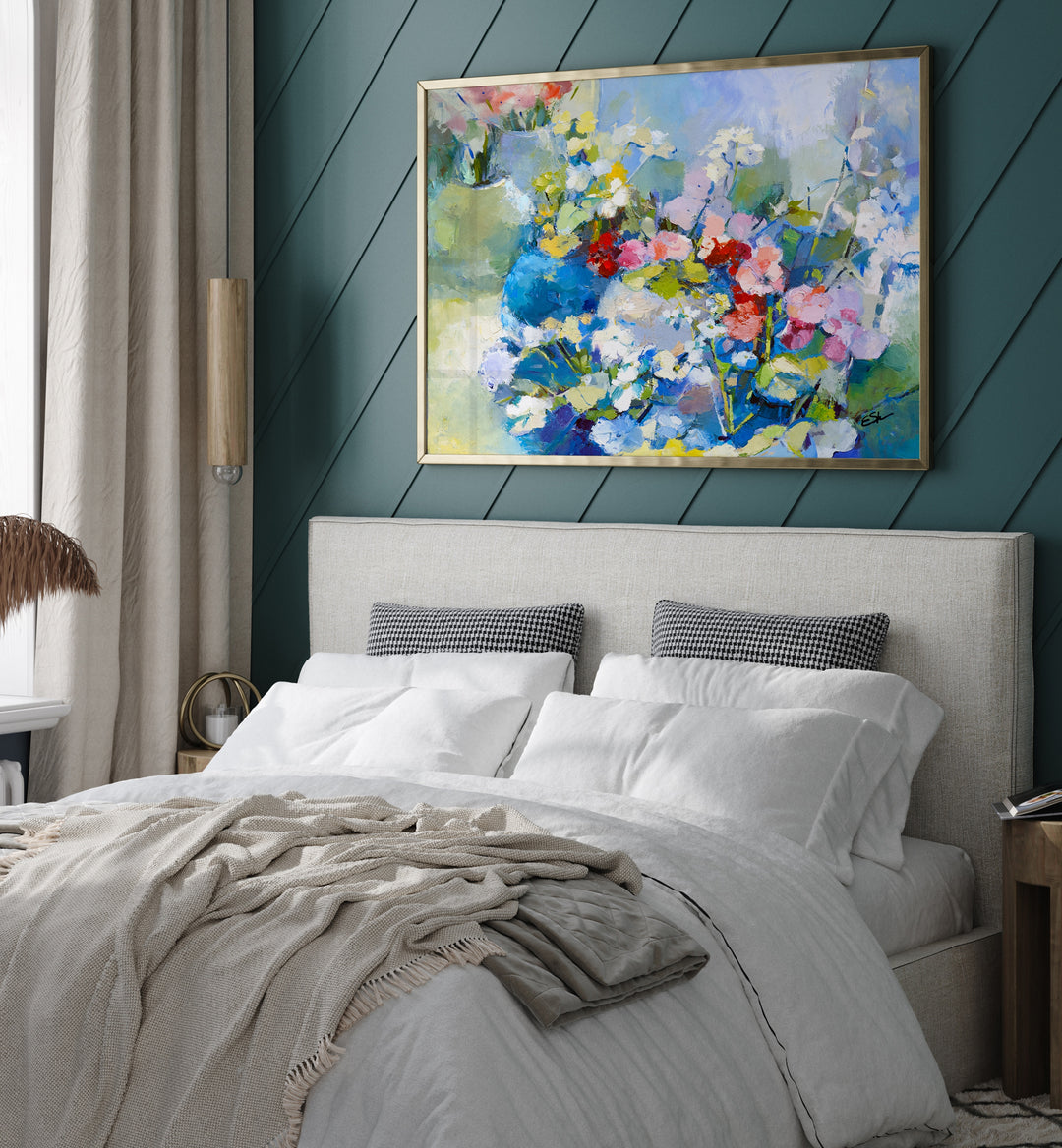 Vibrant WILDFLOWERS, ABSTRACT PAINTINGS brighten up a cozy bedroom, adding a touch of nature's beauty.