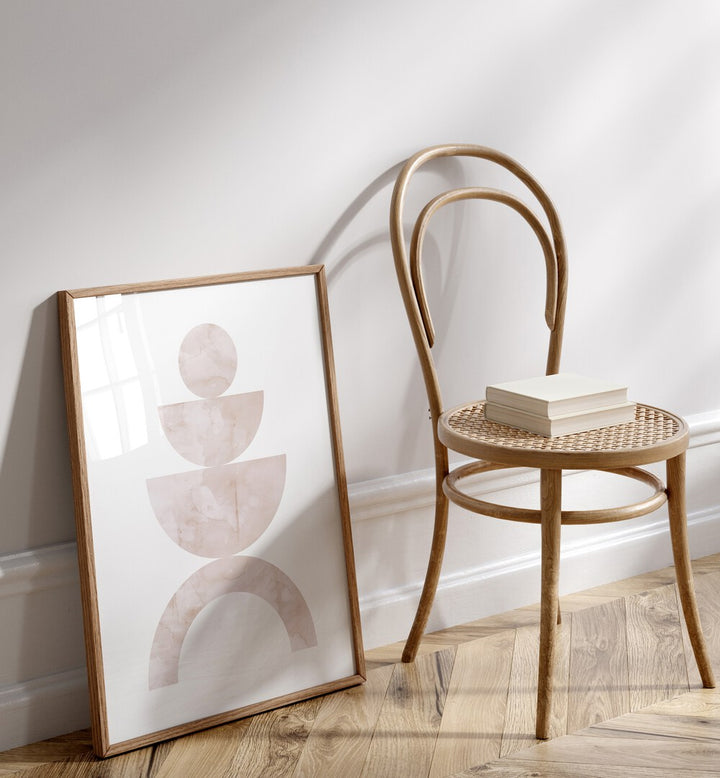 Stylish WATERCOLORS V, BOHO ART PAINTINGS displayed next to a chair, enhancing any contemporary decor.