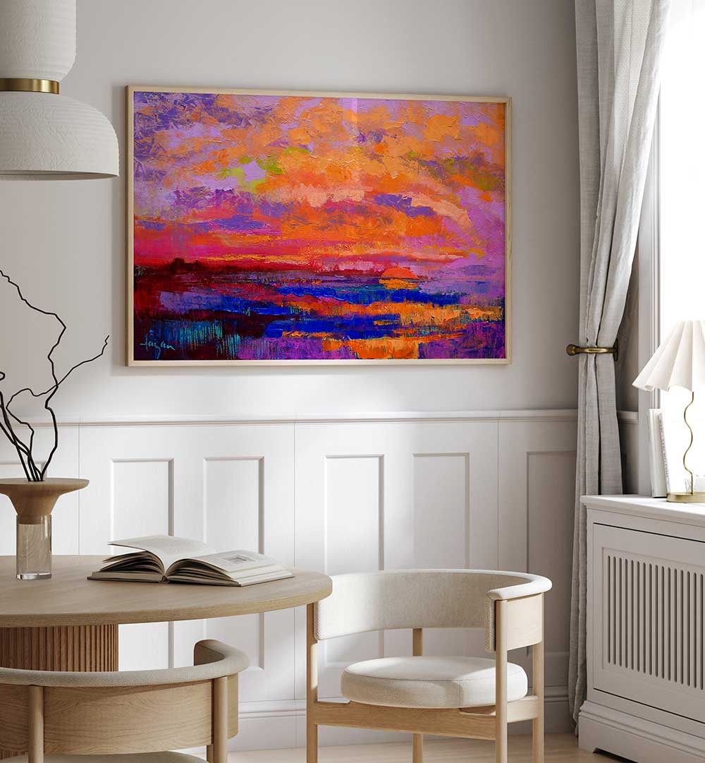 SUNSET HUES , LANDSCAPE PAINTINGS framed textured sunset landscape in warm orange, pink and purple tones above a cozy dining nook