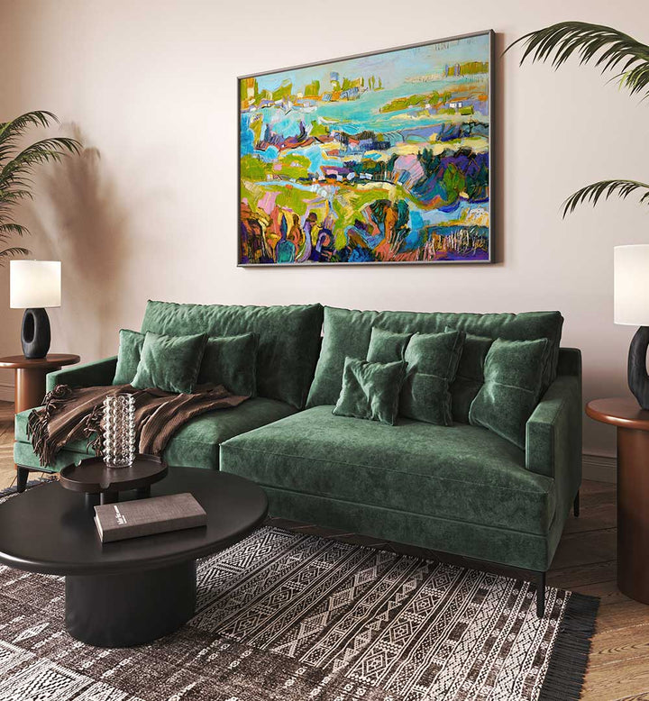 Framed VIBRANT LANDSCAPE , LANDSCAPE PAINTINGS above emerald sofa in modern living room
