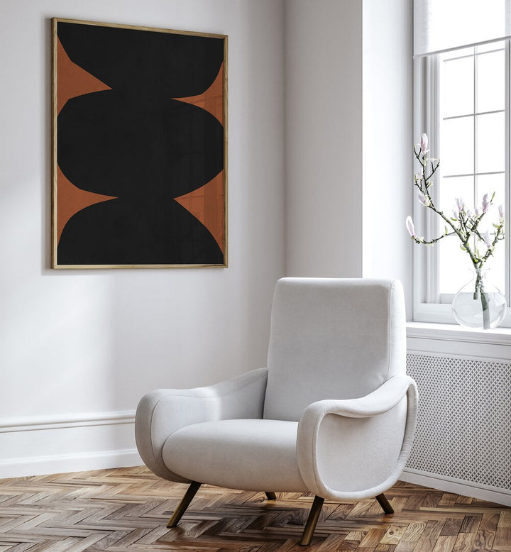 Stylish TRIBAL VII, GEOMETRIC ART PRINTS displayed above a cozy chair, enhancing modern decor with bold designs.