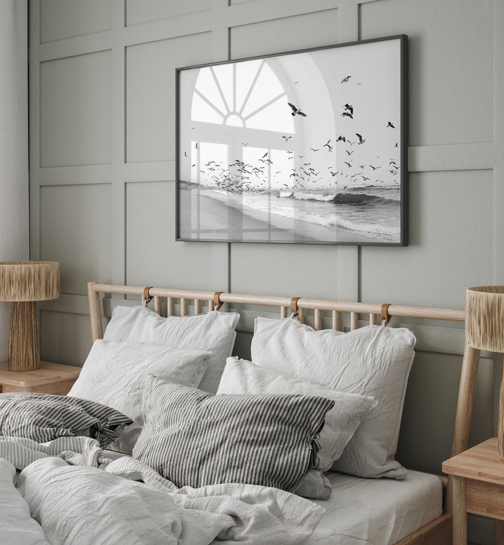 Stylish SEASCAPE BW, BEACH PAINTINGS above a cozy bed, enhancing coastal-themed home décor with serene vibes.