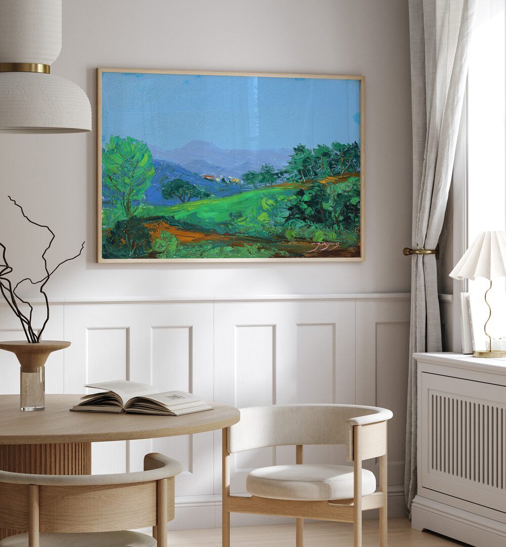Lush green hillside landscape painting brightens a modern interior, showcasing the beauty of GREEN HILLSIDE, LANDSCAPE PAINTINGS.
