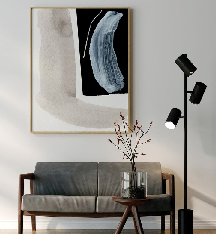 Stunning ADJACENT, ABSTRACT PAINTINGS displayed above a modern couch, enhancing contemporary living spaces.