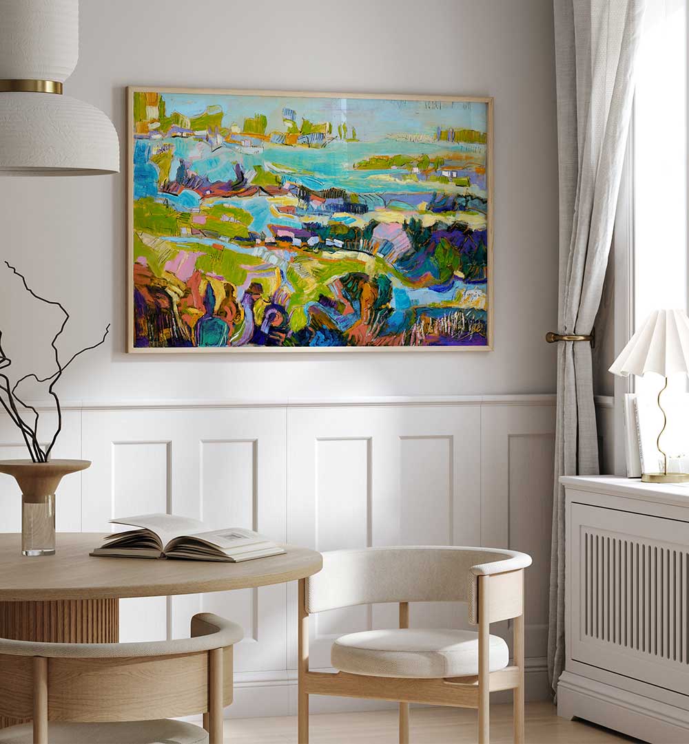 VIBRANT LANDSCAPE , LANDSCAPE PAINTINGS colorful abstract seascape hung above a dining table in a light modern room