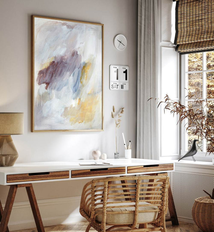 Ethereal brushstrokes in abstract paintings enhance a stylish workspace, perfect for modern decor.