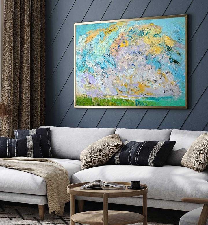 WHIMSICAL CLOUDSCAPE , LANDSCAPE PAINTINGS framed pastel cloudscape with luminous horizons above sofa in modern living room