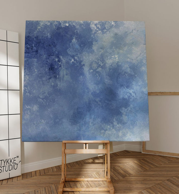 Stunning CHASING BLUE SKIES, ABSTRACT PAINTINGS displayed on an easel, perfect for adding color to any space.