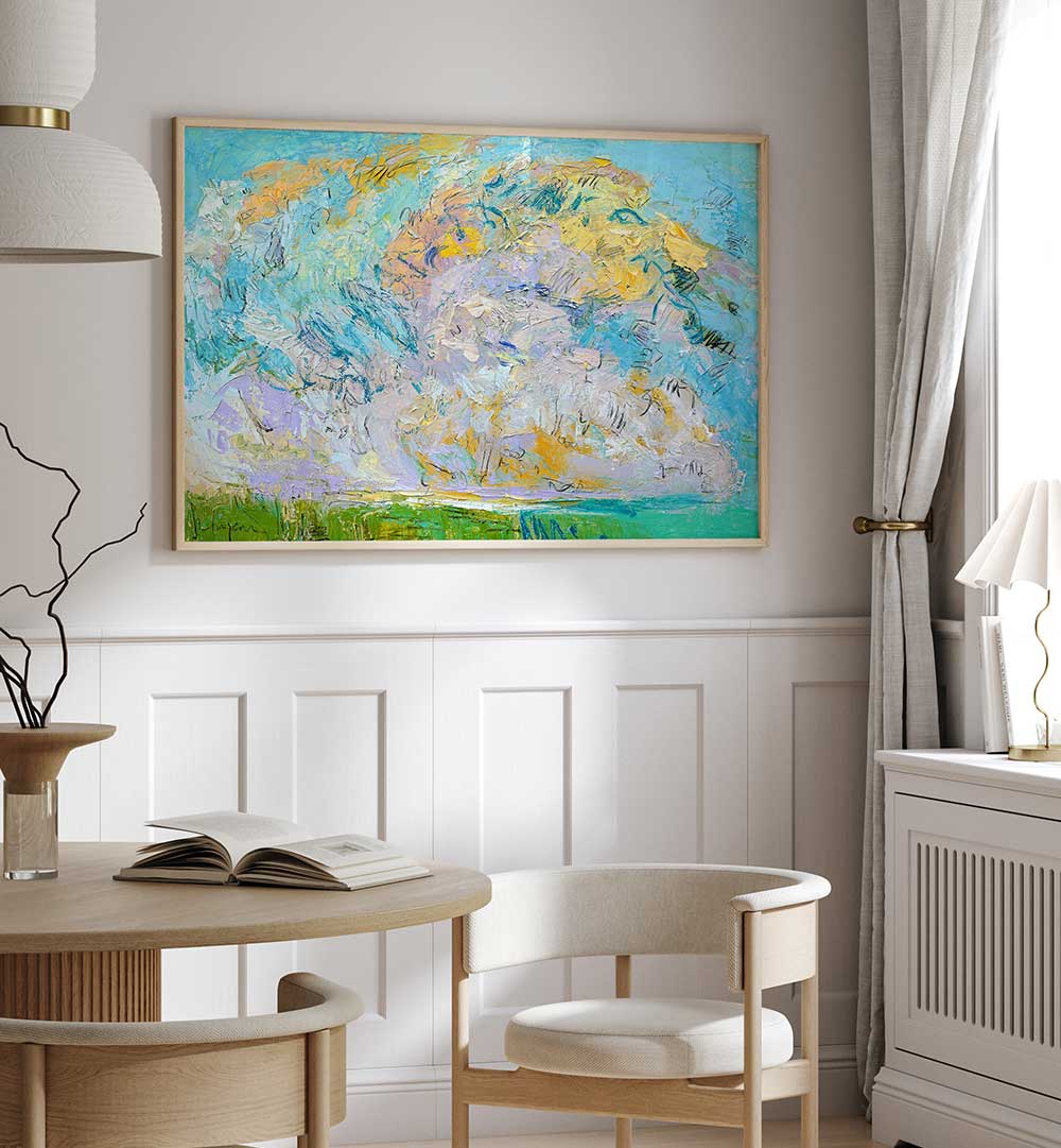 WHIMSICAL CLOUDSCAPE , LANDSCAPE PAINTINGS — textured pastel cloudscape above a green horizon hanging in a cozy dining nook