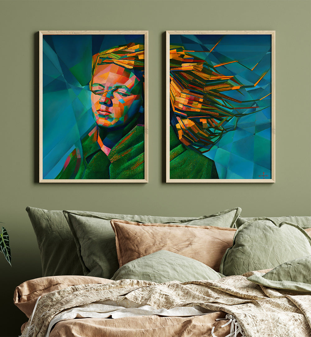 Two abstract artworks on a wall above a sofa with pillows.