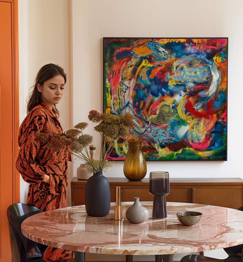 Stylish woman beside the BRONX WALLL, ABSTRACT PAINTINGS, showcasing vibrant colors in a chic living space.