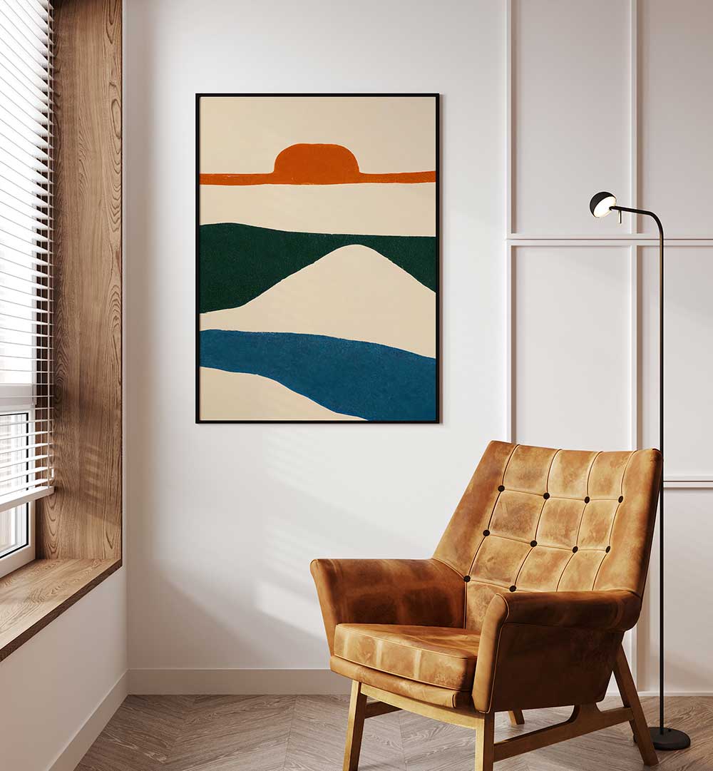 PUESTA DEL SOL , ABSTRACT PAINTINGS with vibrant earth tones displayed above a leather chair in a modern living space
