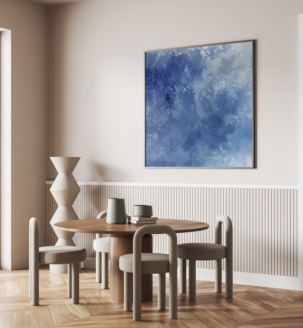 Elegant CHASING BLUE SKIES, ABSTRACT PAINTINGS enhance a modern dining space with calming blue hues and style.