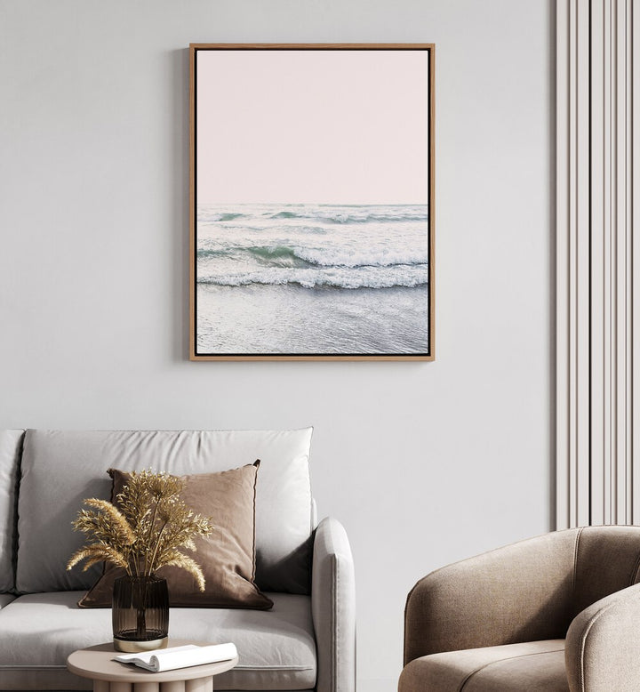 Serene BLUSH OCEAN, BEACH PAINTINGS displayed in a stylish living room, enhancing tranquil home decor.
