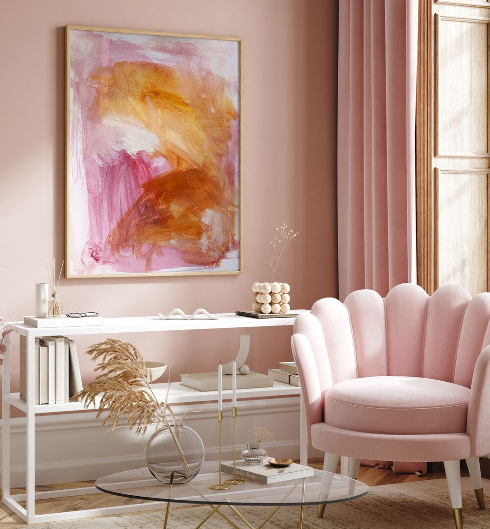 Abstract painting titled "LOVE & MERCY" adds warmth to a stylish pink room for an inviting atmosphere.