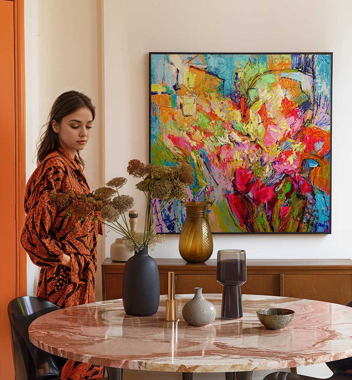 BRILLIANT BLOOM SCAPE , ABSTRACT PAINTINGS vibrant floral abstract canvas above dining table with vases and woman nearby