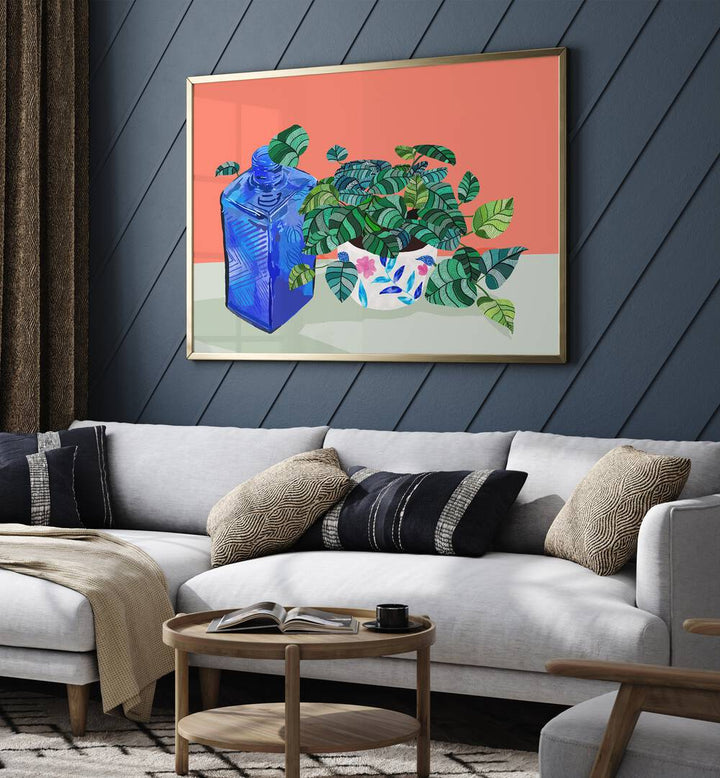 A Still Life Moment By Uma Gokhale Botanical Art Prints in Gold Plain Frame on a wall behind a sofa for living room