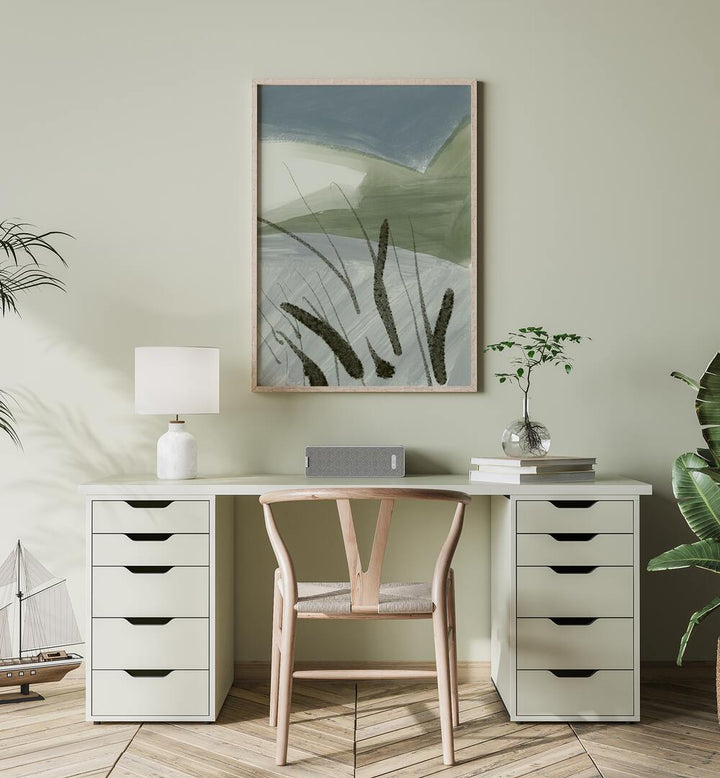 Stylish workspace featuring ABSTRACT LAND SHAPES, ABSTRACT PAINTINGS on the wall, enhancing the serene decor.