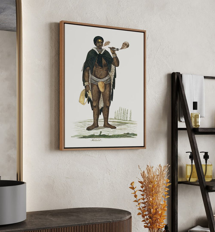 African Tribal African Art Painting Artwork in oakwood floater frame on a white wall beside a shelf