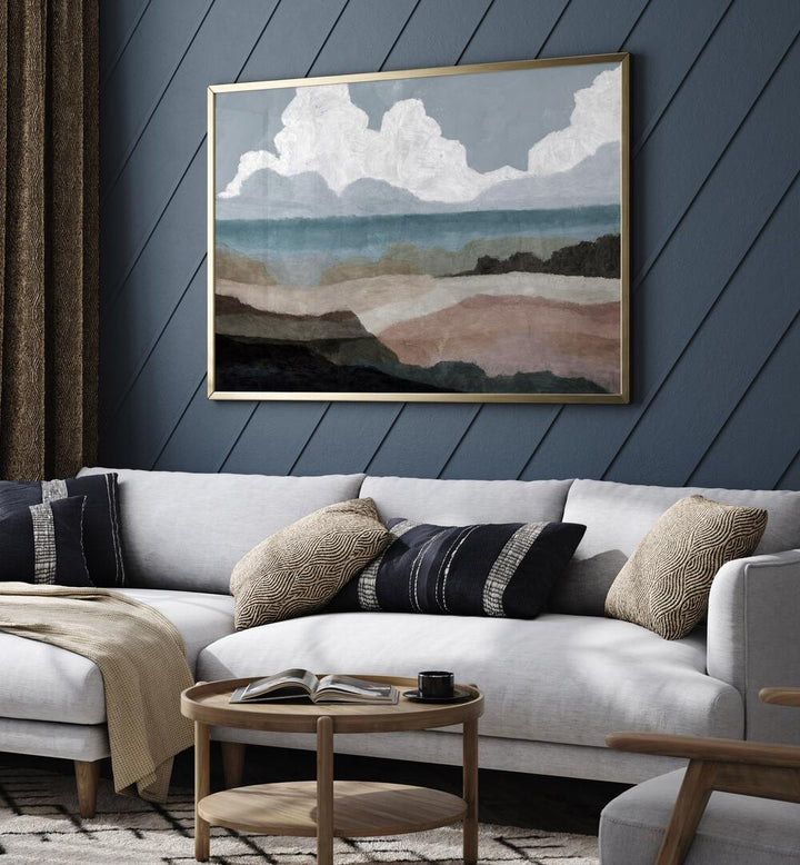 Alderney landscape paintings adorn a modern living space, showcasing nature's beauty in serene colors and textures.