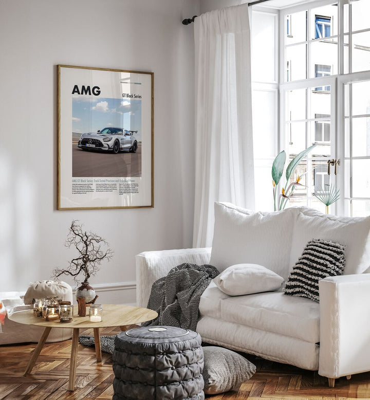 AMG GT Black Series Car Posters Automotive Wall Art Prints in Oak Wood Plain Frame placed on a White Colored Wall near a White Sofa in the Living Room