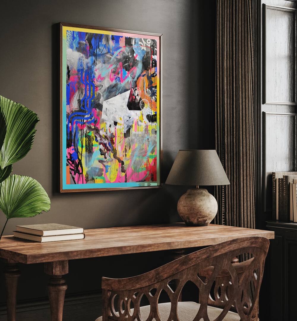 Abstra by Famous When Dead Pop Art Paintings Pop Art Prints in Dark Wood Plain Frame placed on a wall behind a study table 