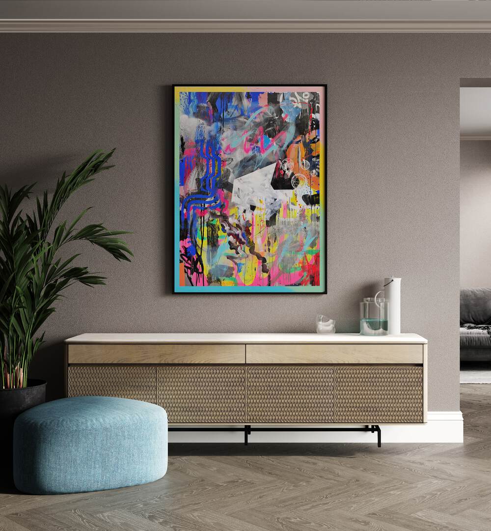 Abstra by Famous When Dead Pop Art Paintings Pop Art Prints in Black Plain Frame placed on a wall behind a console table